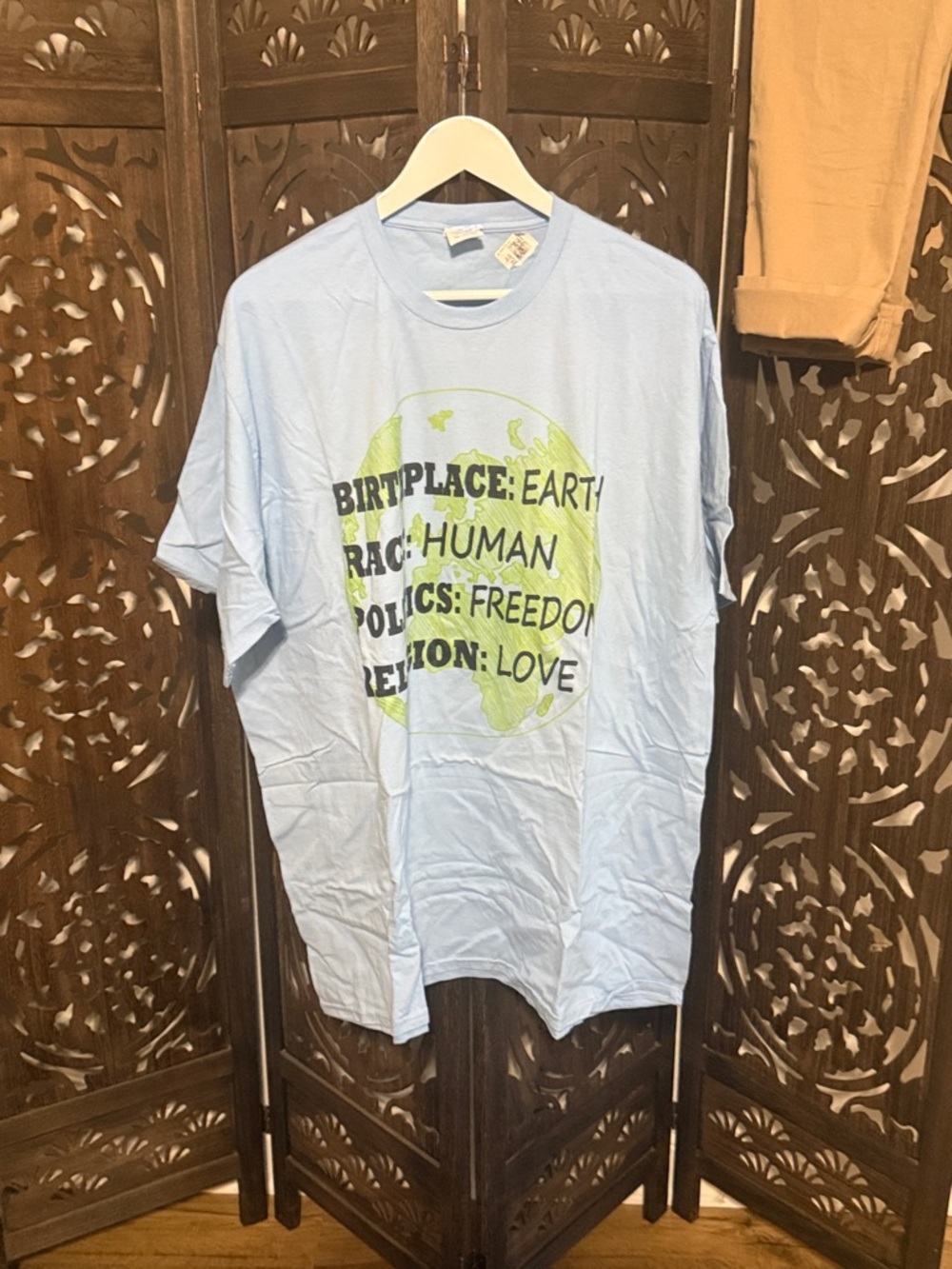 Light Blue Graphic Tee with Green Globe Print
